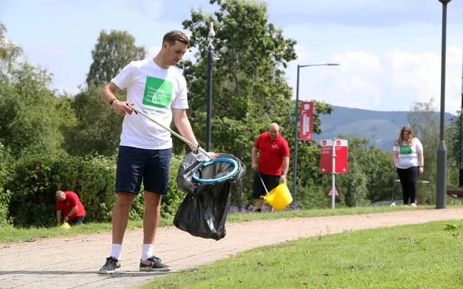 usw staff picking up litter on the pontypridd treforest campus