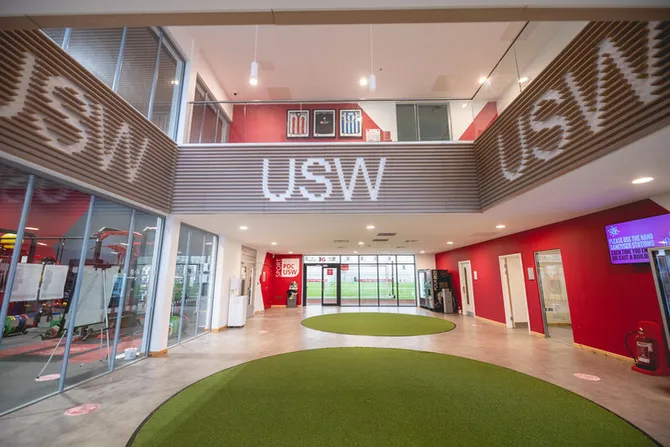 An indoor area of the USW sport park that leads to the indoor 3G pitch and the strength and conditioning suite.