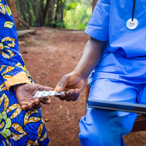 Doctor prescribing medicine to an elderly patient