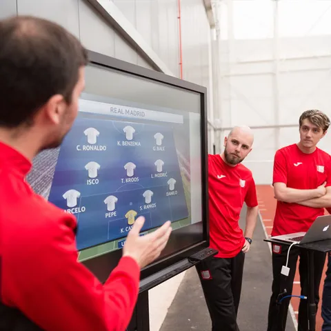 A football academic talks through strategies seen in action to coaching and performance students at USW Sports Park