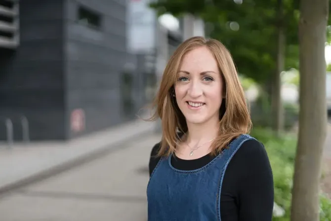 Therapeutic Studies lecturer, Beth Pickard, smiles for a photo outside Newport campus