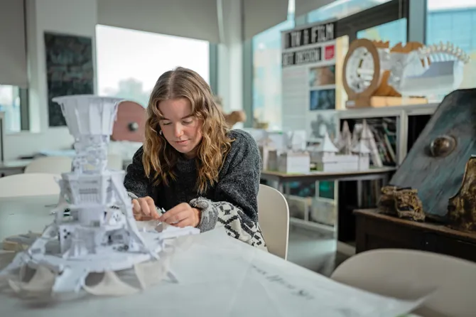 TV and Film Set Design student working in a studio in Cardiff Campus.