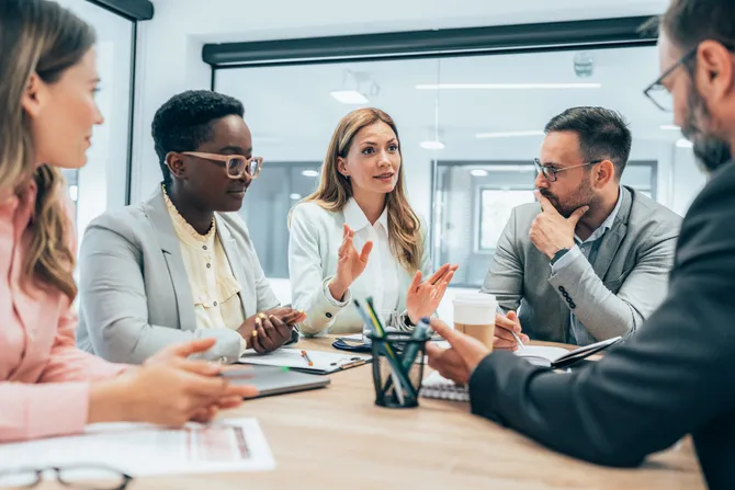 A business team discussing ideas in an office.