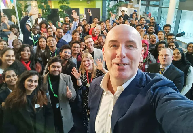 A selfie taken by Andrew Thompson, course leader of MBA Global, surrounded by students