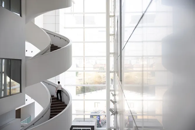 A view of the spiral stairwell set in the main foyer of Cardiff Campus.
