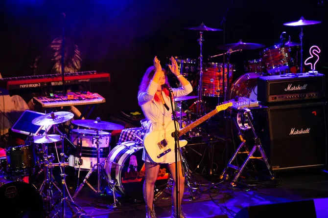 A music student performing at Immersed