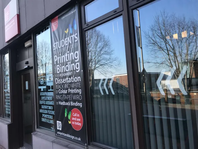the front of the print and design shop on campus