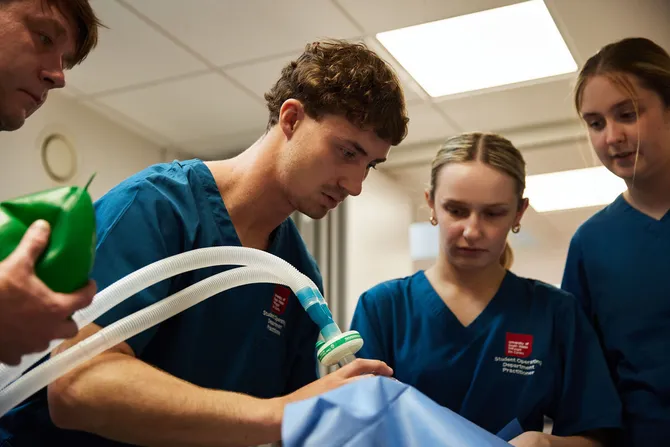 Operating Department Practice students with ventilator.