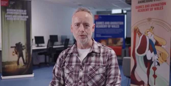 Lecturer talking to camera