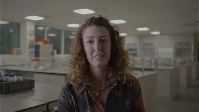 Lecturer talking to camera