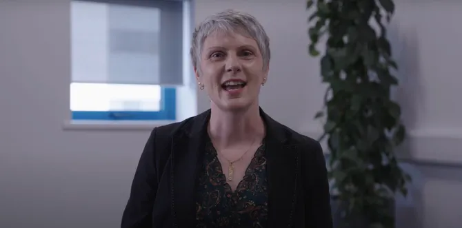 Lecturer talking to camera