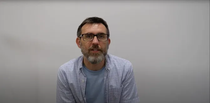 Lecturer talking to camera