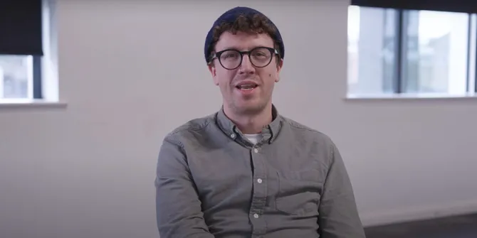 Lecturer talking to camera