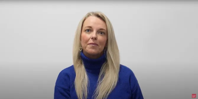 Midwifery lecturer talking to camera