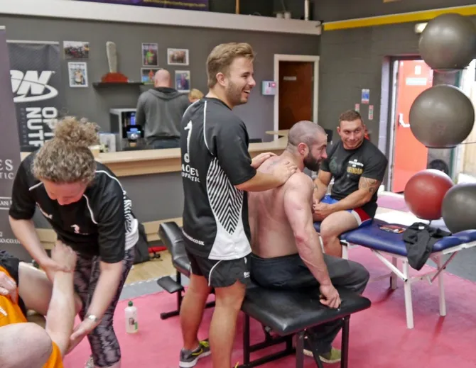 Daniel Morgan working in chiropractic clinic