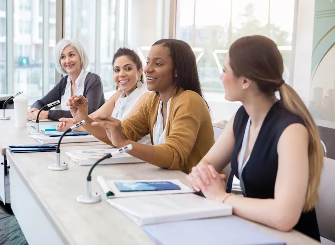Women leaders at desk