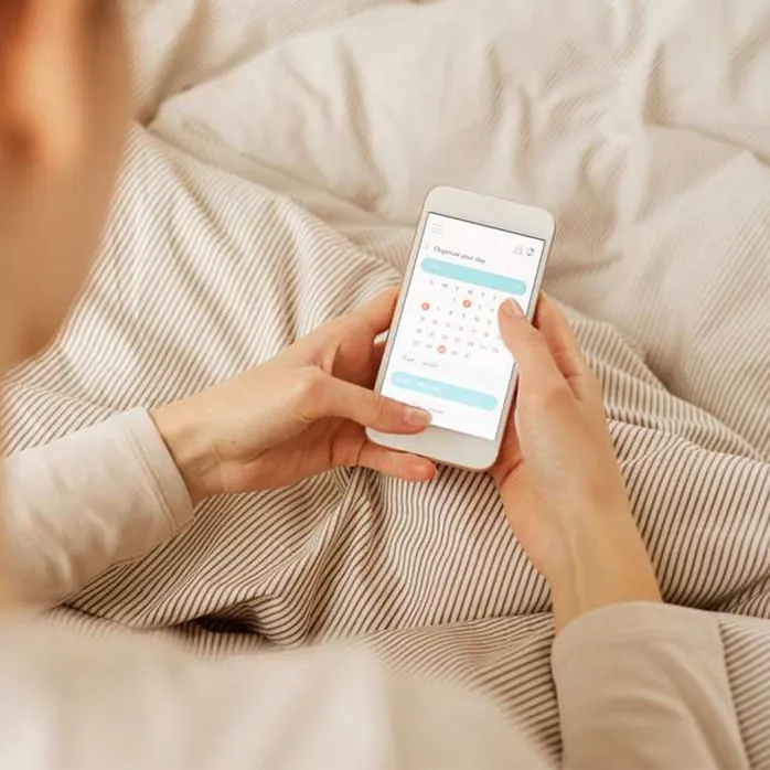 A women using an app on her smartphone
