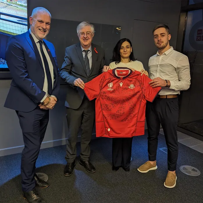 Dr Ben Calvert, Vice Chancellor, Mark Drakeford, First Minister, Kristine Dzagnidze and Levan Kvinikadze stood together during the visit