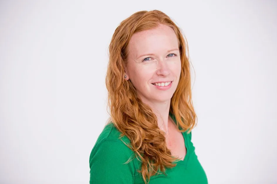 Image of Professor Katy Holloway, wearing a green jumper.