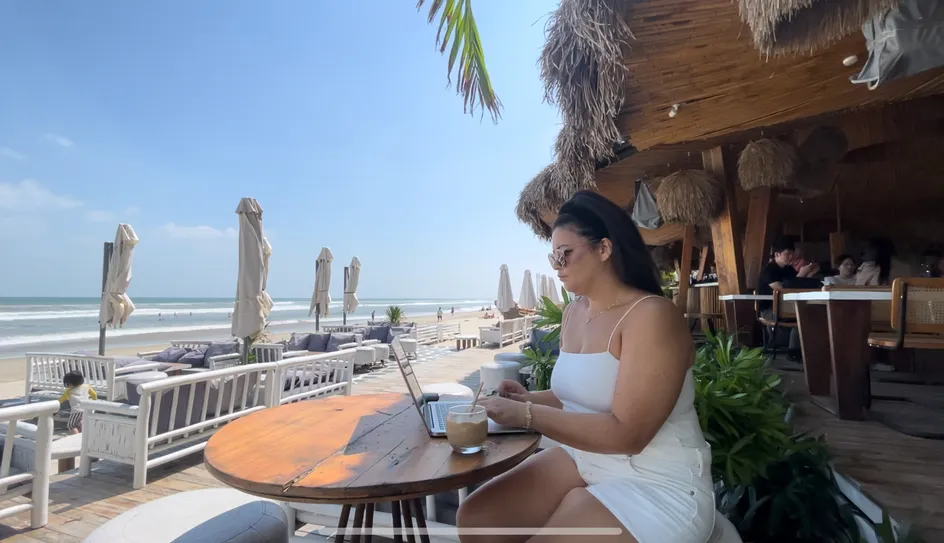 Tasha Cole sits at a table