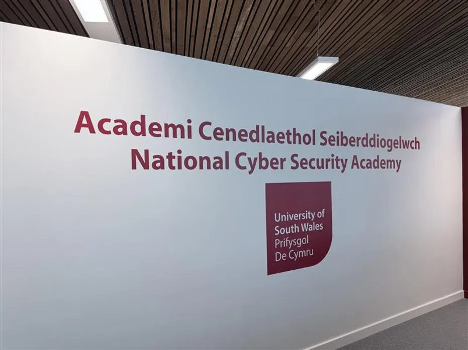 The sign saying National Cyber Security Academy at the entrance to the University of South Wales department