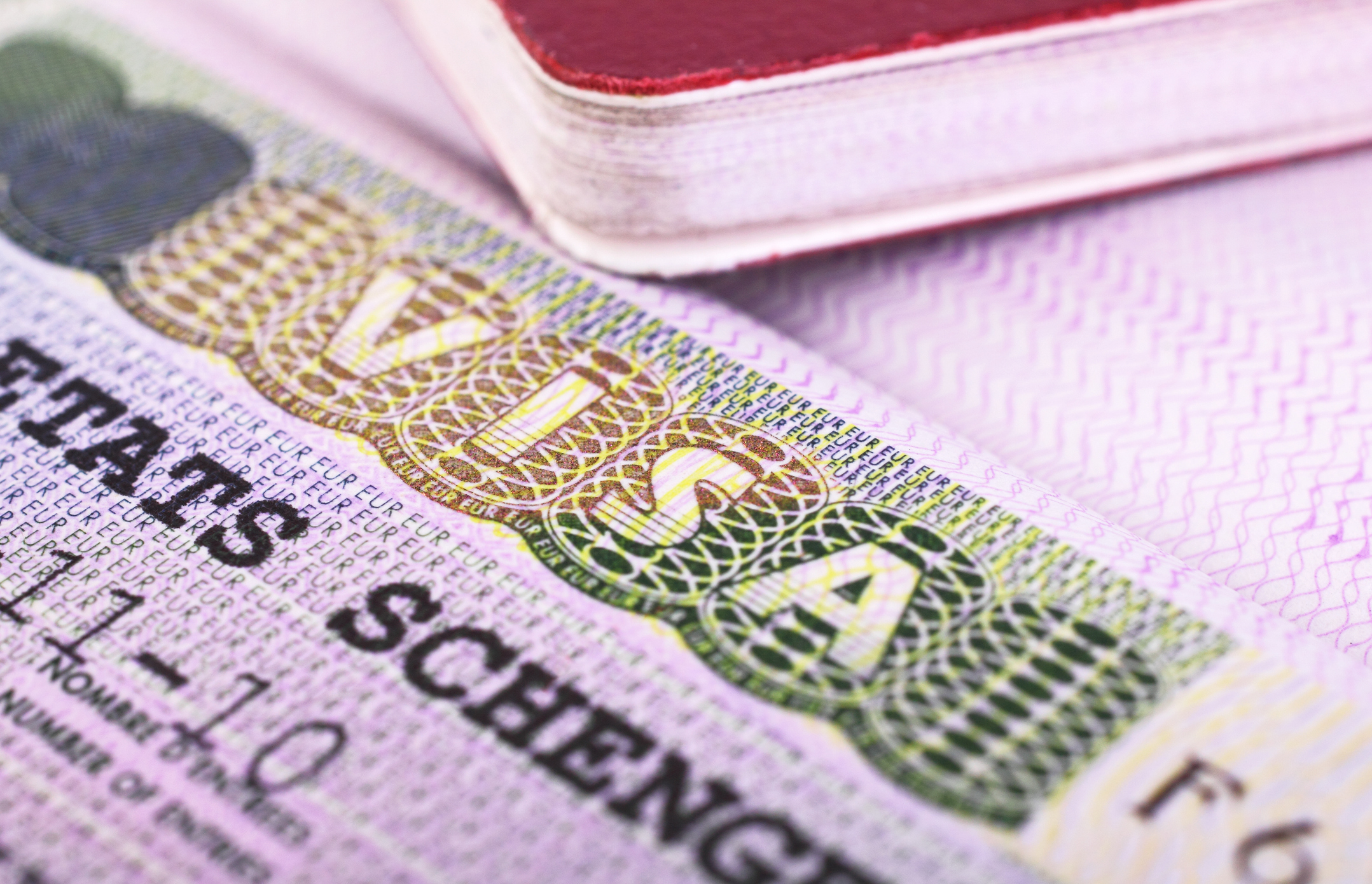 A close up of the word 'Visa' on a Schengen Visa