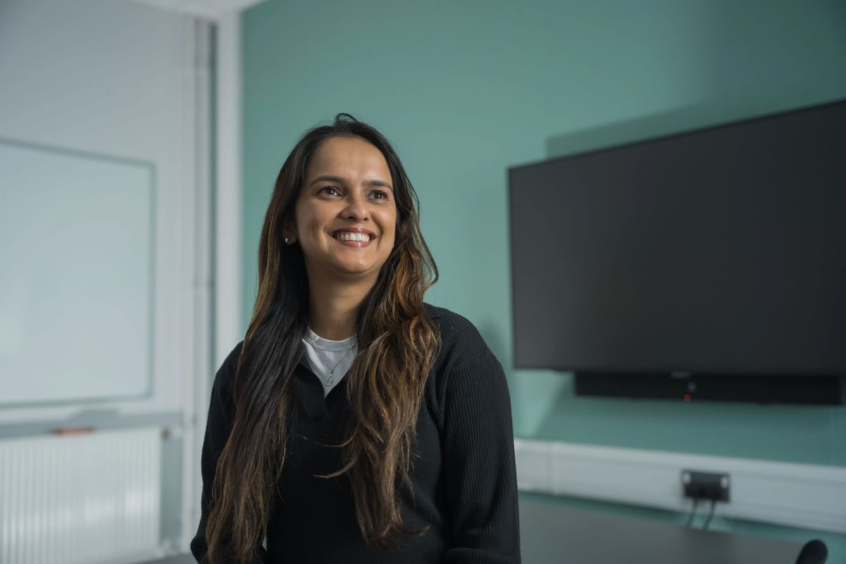 Counselling and Therapeutic Practice student Vee smiles for a profile shot