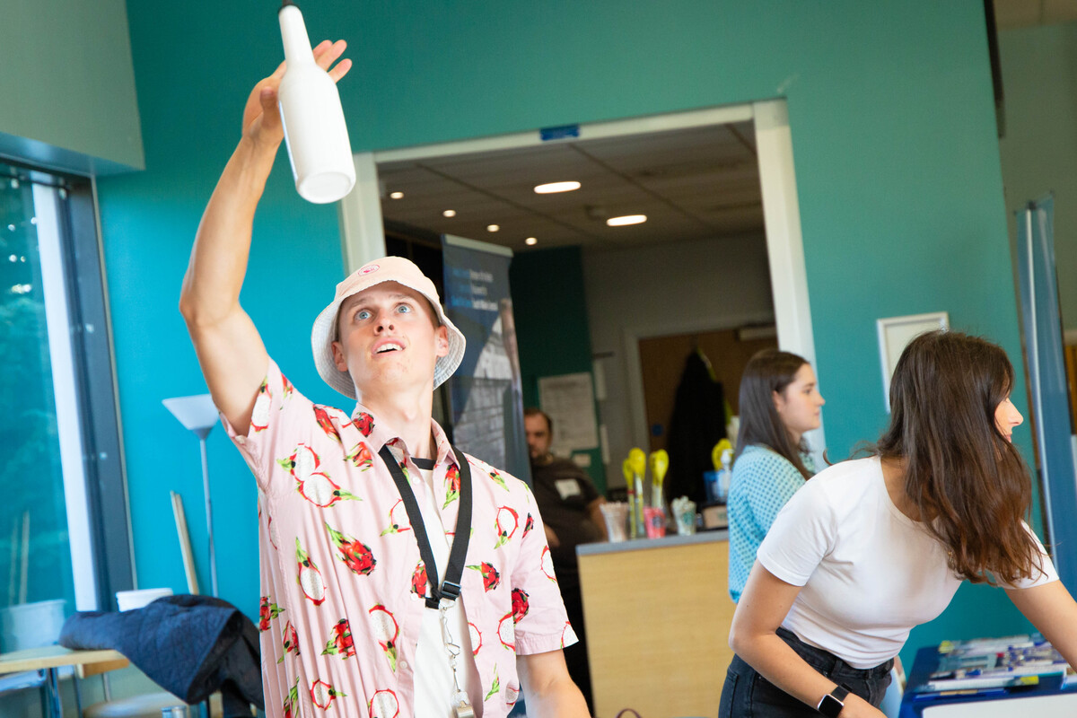 A juggler performing during welcome fest in cardiff