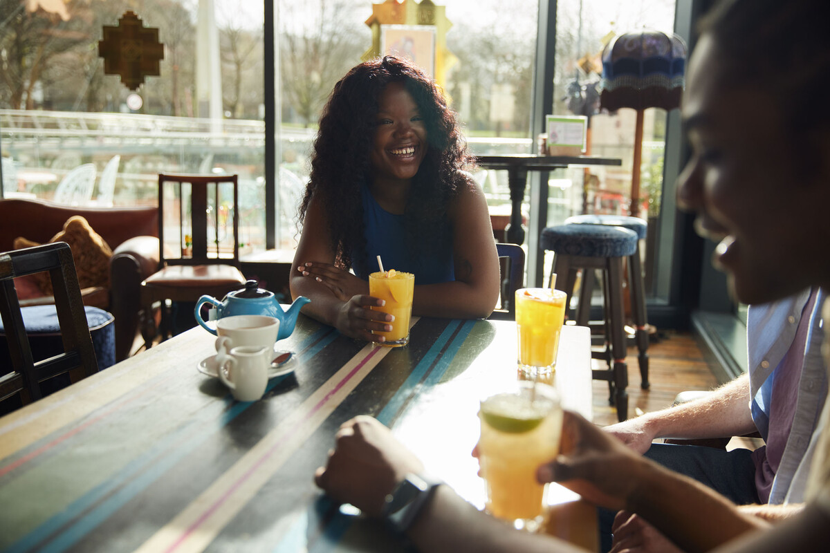 Students sitting at a table in a restaurant in Pontypridd.