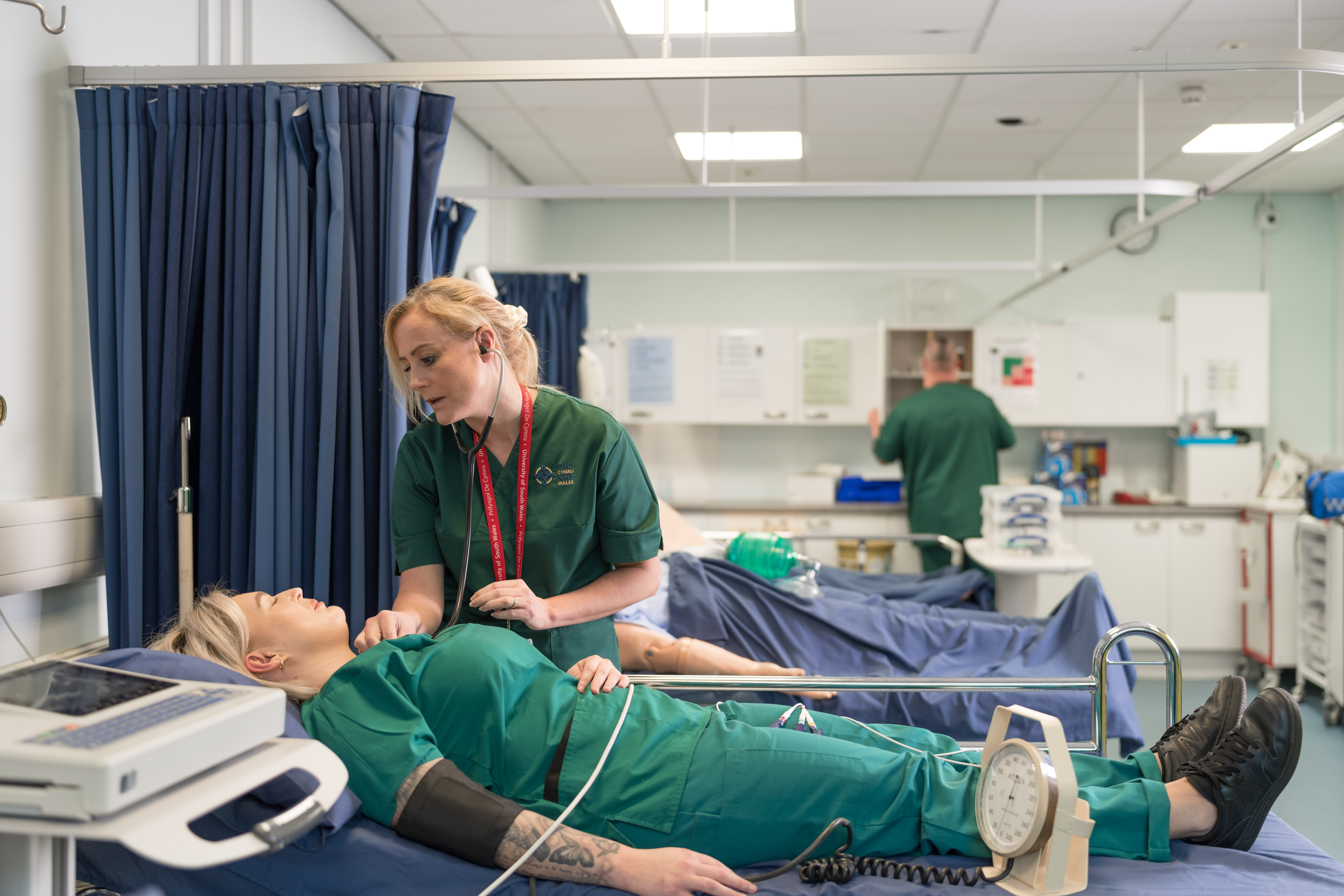 A student on placement practices examination techniques on another student