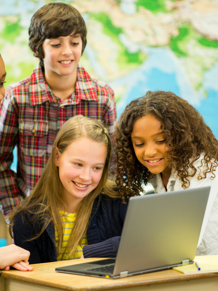 School children on laptop