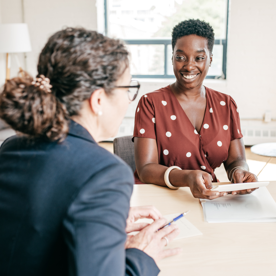 Woman receiving career mentoring